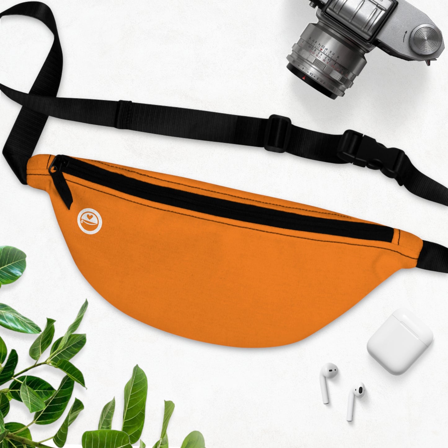 Hunter Blaze Orange - The Allsack - Orders ship within three (3) Business Days of order Personalization is free of charge Includes credit card holders Black lining with inside divider and zipper pocket on the back Adjustable waist band 100% Polyester One size One-sided print Assembled in the USA from globally sourced parts